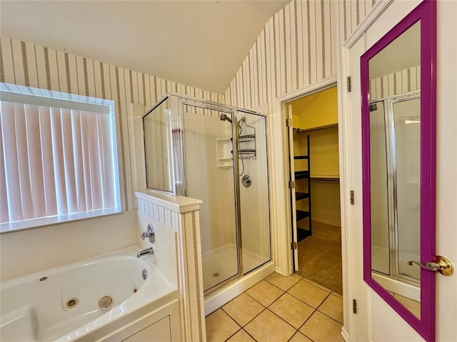 4409 Whitmere Ct, Norman, OK 73072 - full bathroom featuring wallpapered walls, a stall shower, a whirlpool tub, tile patterned floors, and a spacious closet