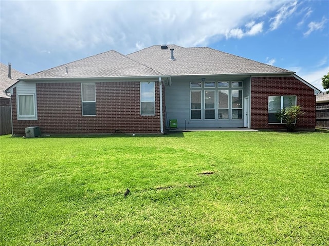 4409 Whitmere Ct, Norman, OK 73072 - back of house with brick siding and roof with shingles