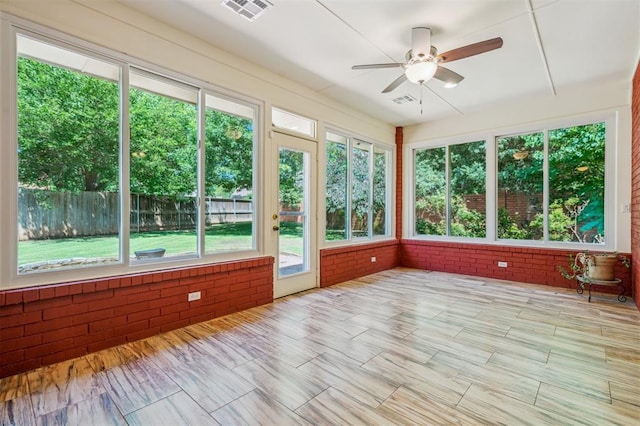 4609 Summerfield Ct, Norman, OK 73072 - unfurnished sunroom with plenty of natural light and brick wall