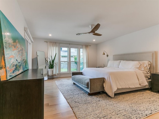 4107 Northhampton Dr, Norman, OK 73072 - bedroom with light wood-type flooring, a ceiling fan, and recessed lighting