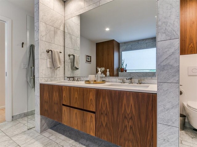 4107 Northhampton Dr, Norman, OK 73072 - bathroom with double vanity and marble finish flooring