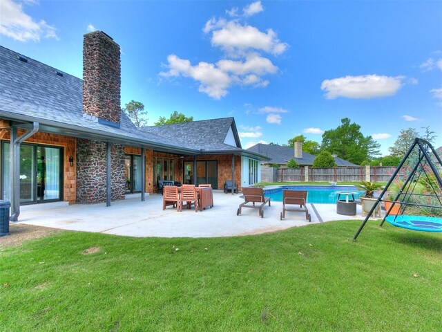 4107 Northhampton Dr, Norman, OK 73072 - view of pool featuring a fenced backyard, a patio, and an outdoor hangout area