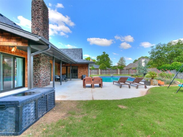4107 Northhampton Dr, Norman, OK 73072 - fenced backyard featuring a patio