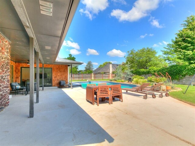 4107 Northhampton Dr, Norman, OK 73072 - fenced backyard with a patio area