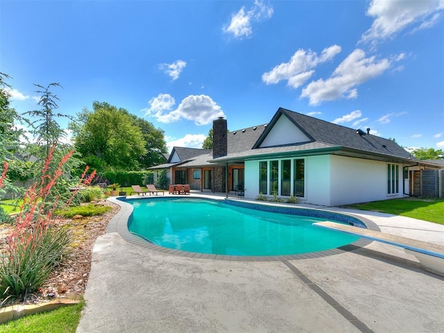 4107 Northhampton Dr, Norman, OK 73072 - outdoor pool featuring a patio and a diving board