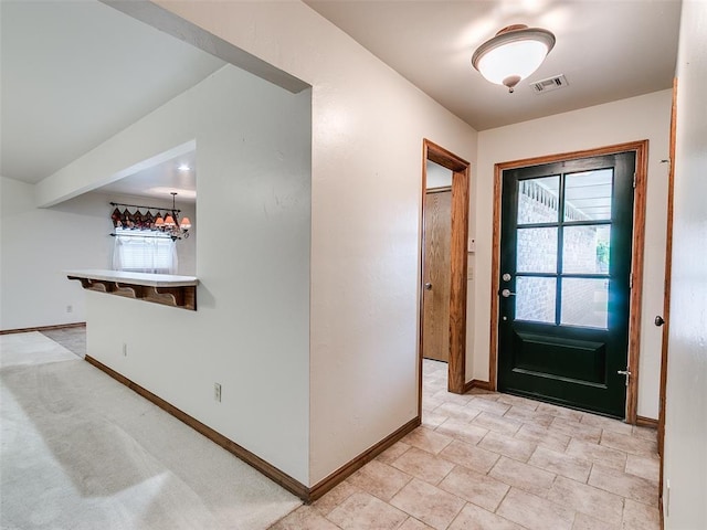 7204 Walnut Creek Dr, Oklahoma City, OK 73142 - entryway with baseboards and light stone finish flooring