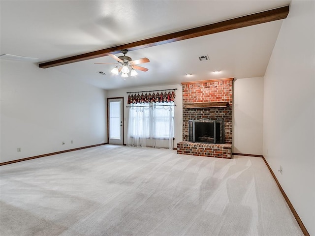 7204 Walnut Creek Dr, Oklahoma City, OK 73142 - unfurnished living room featuring carpet floors, a ceiling fan, and a fireplace