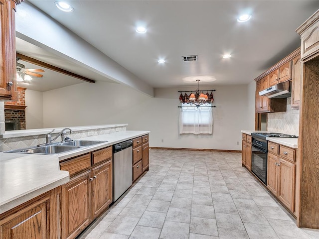 7204 Walnut Creek Dr, Oklahoma City, OK 73142 - kitchen with dishwasher, under cabinet range hood, decorative backsplash, light countertops, and recessed lighting