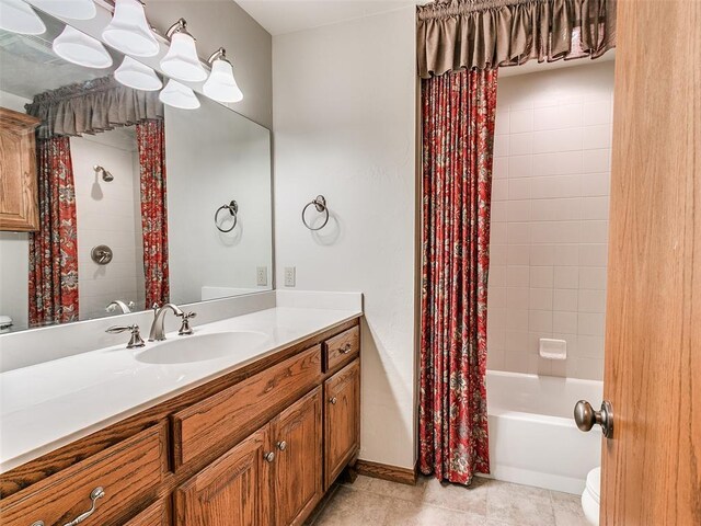 7204 Walnut Creek Dr, Oklahoma City, OK 73142 - full bathroom featuring vanity, shower / tub combo with curtain, and tile patterned floors