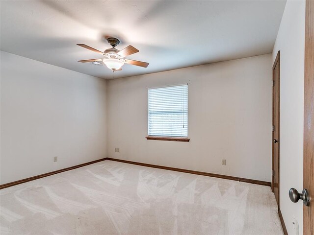 7204 Walnut Creek Dr, Oklahoma City, OK 73142 - empty room with light carpet and a ceiling fan