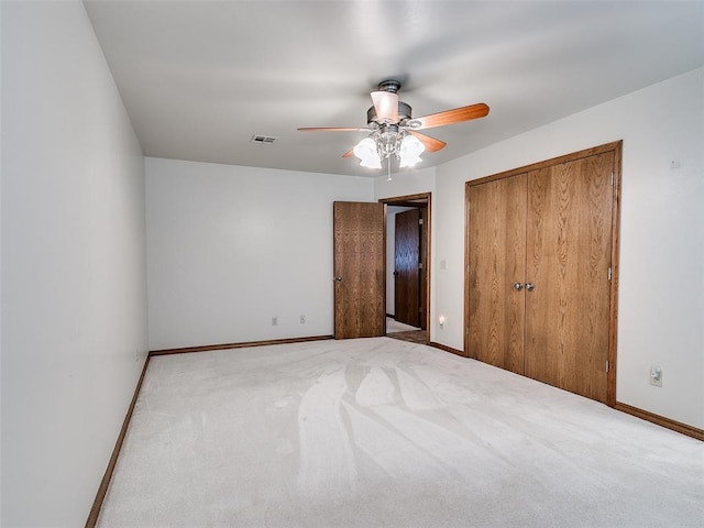 7204 Walnut Creek Dr, Oklahoma City, OK 73142 - unfurnished bedroom featuring carpet floors, a closet, and ceiling fan