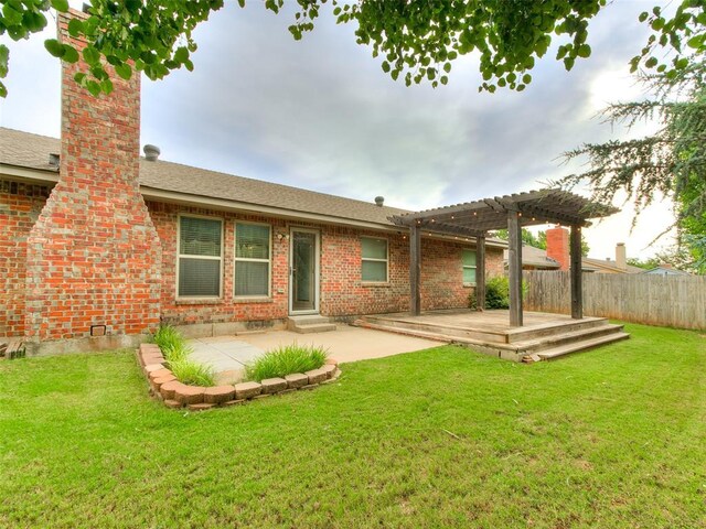 7204 Walnut Creek Dr, Oklahoma City, OK 73142 - rear view of property with a pergola, brick siding, a patio, and a wooden deck