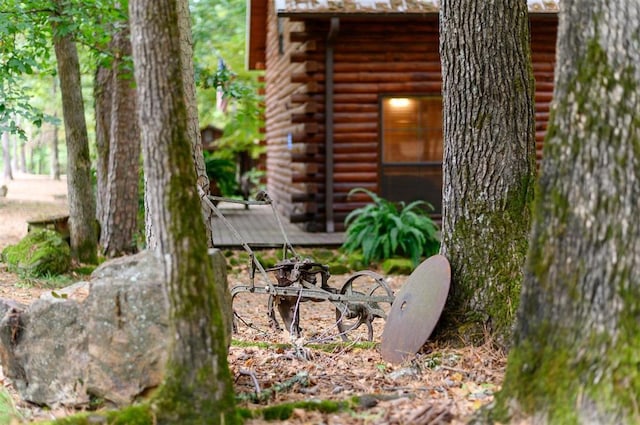 185 Marlin Dr, Broken Bow, OK 74728 - exterior view of log siding
