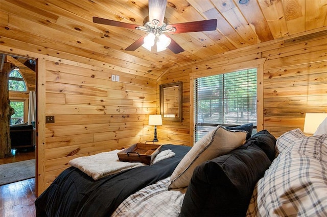 185 Marlin Dr, Broken Bow, OK 74728 - bedroom with multiple windows, wood walls, wood-type flooring, wood ceiling, and vaulted ceiling