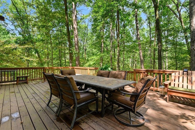 185 Marlin Dr, Broken Bow, OK 74728 - wooden terrace featuring outdoor dining area