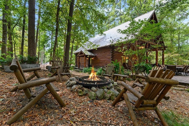 185 Marlin Dr, Broken Bow, OK 74728 - view of yard featuring an outdoor fire pit