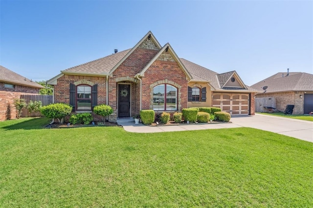 908 Carol Ann Pl, Moore, OK 73160 - view of front of property with brick siding, concrete driveway, a garage, and a shingled roof
