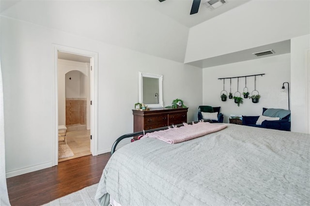 908 Carol Ann Pl, Moore, OK 73160 - bedroom with dark wood-style floors, high vaulted ceiling, a ceiling fan, and connected bathroom
