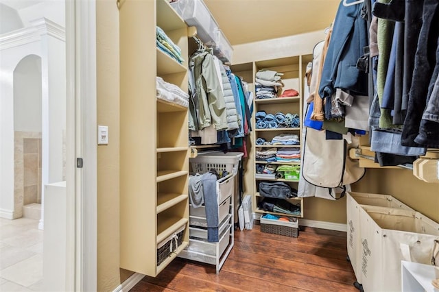 908 Carol Ann Pl, Moore, OK 73160 - spacious closet with arched walkways and wood finished floors