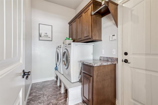 908 Carol Ann Pl, Moore, OK 73160 - laundry room with cabinet space and washing machine and clothes dryer