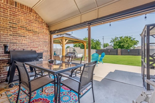 908 Carol Ann Pl, Moore, OK 73160 - fenced backyard featuring a gazebo, outdoor dining space, and a patio