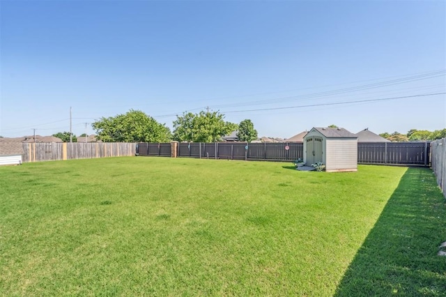 908 Carol Ann Pl, Moore, OK 73160 - fenced backyard featuring a storage unit