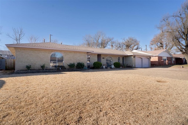 5108 NW 19th Ter, Oklahoma City, OK 73127 - single story home featuring a garage and brick siding