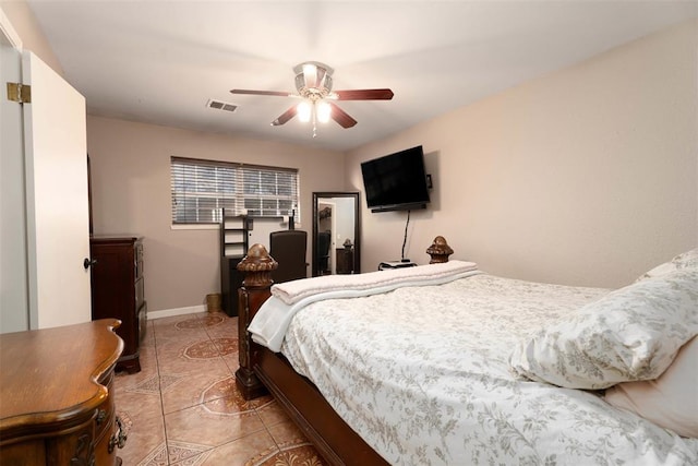 5108 NW 19th Ter, Oklahoma City, OK 73127 - bedroom featuring light tile patterned floors, baseboards, and ceiling fan