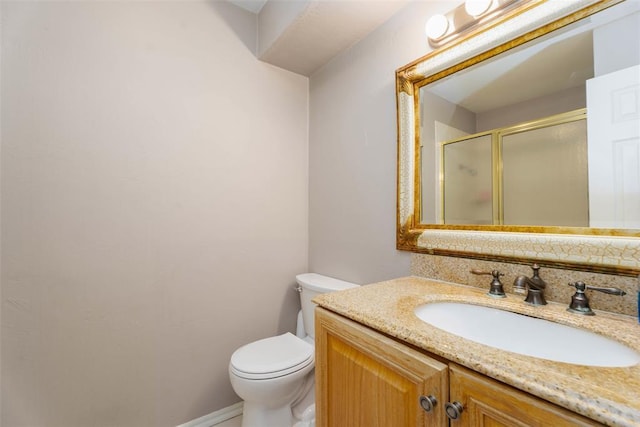 5108 NW 19th Ter, Oklahoma City, OK 73127 - full bath with a stall shower, vanity, toilet, tasteful backsplash, and baseboards