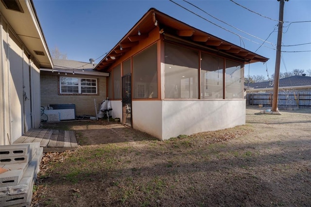 5108 NW 19th Ter, Oklahoma City, OK 73127 - view of side of property with a sunroom