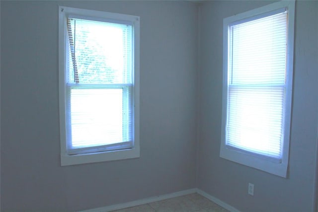 1521 SW 45th St, Oklahoma City, OK 73119 - empty room featuring healthy amount of natural light and baseboards