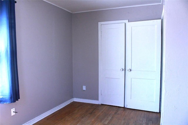 1521 SW 45th St, Oklahoma City, OK 73119 - unfurnished bedroom featuring wood finished floors, crown molding, and baseboards