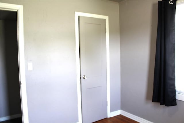 1521 SW 45th St, Oklahoma City, OK 73119 - unfurnished bedroom featuring baseboards and dark wood-type flooring