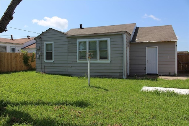 1521 SW 45th St, Oklahoma City, OK 73119 - back of property featuring roof with shingles