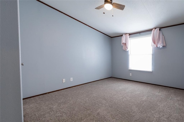 20649 E 1110th Rd, Canute, OK 73626 - unfurnished room featuring carpet flooring, a ceiling fan, and baseboards