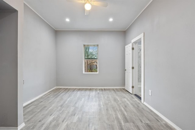 305 E Laurel St, Hugo, OK 74743 - unfurnished bedroom featuring wood finished floors, baseboards, recessed lighting, and a ceiling fan