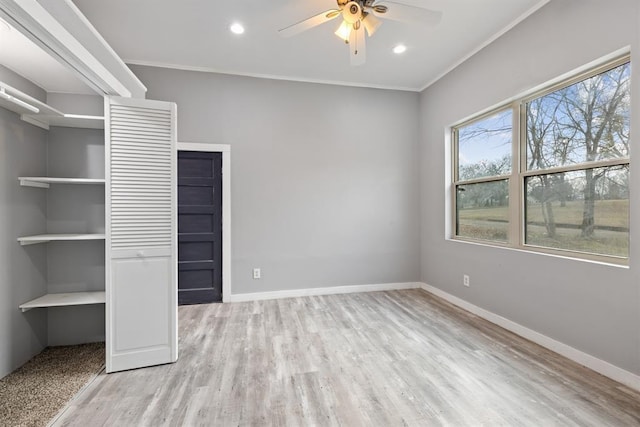 305 E Laurel St, Hugo, OK 74743 - unfurnished bedroom with wood finished floors, baseboards, crown molding, recessed lighting, and ceiling fan
