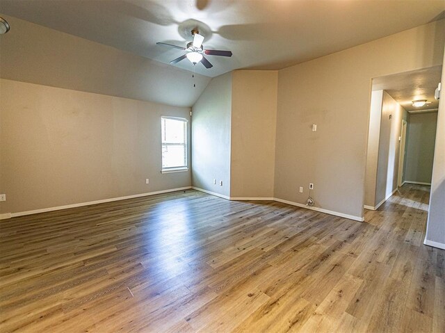 4212 Bonaparte Blvd, Midwest City, OK 73110 - unfurnished room with ceiling fan, wood finished floors, baseboards, and lofted ceiling