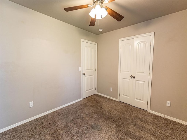 4212 Bonaparte Blvd, Midwest City, OK 73110 - unfurnished bedroom with carpet flooring, baseboards, a closet, and a ceiling fan