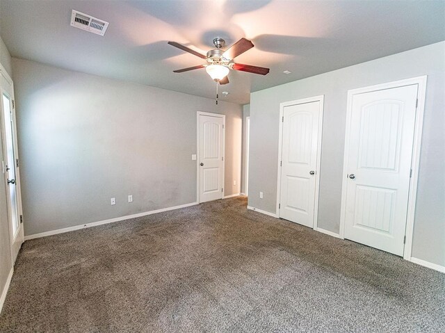 4212 Bonaparte Blvd, Midwest City, OK 73110 - unfurnished bedroom with carpet floors, baseboards, and ceiling fan