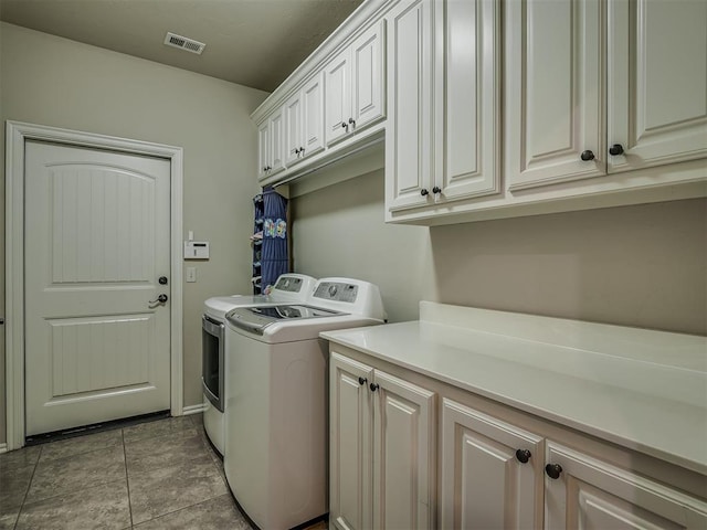 2825 SE 5th St, Moore, OK 73160 - laundry area with washing machine and dryer and cabinet space