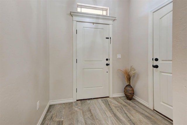 8340 NW 137th St, Oklahoma City, OK 73142 - foyer entrance featuring light wood-style flooring and baseboards