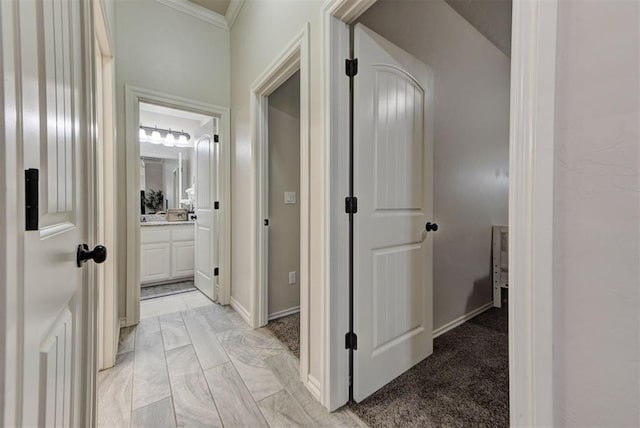 8340 NW 137th St, Oklahoma City, OK 73142 - corridor with crown molding and light marble finish floors