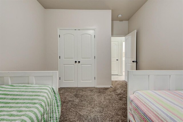 8340 NW 137th St, Oklahoma City, OK 73142 - bedroom with carpet flooring and a closet