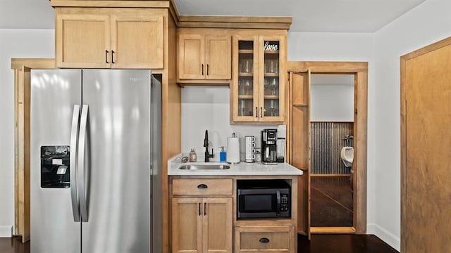 10506 W Smith Rd, El Reno, OK 73036 - kitchen featuring stainless steel fridge with ice dispenser, black microwave, light countertops, and glass insert cabinets