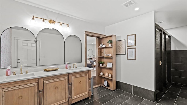 10506 W Smith Rd, El Reno, OK 73036 - bathroom featuring double vanity and tile patterned flooring