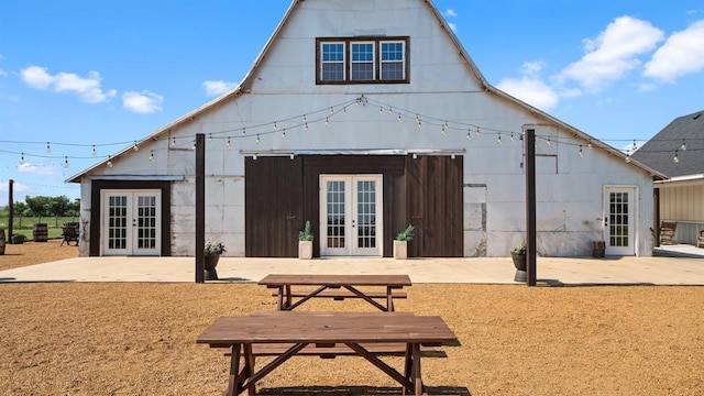 10506 W Smith Rd, El Reno, OK 73036 - rear view of property with french doors and a patio area