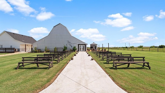 10506 W Smith Rd, El Reno, OK 73036 - view of community with a barn and an outdoor structure