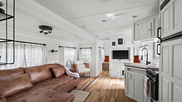 10506 W Smith Rd, El Reno, OK 73036 - living room with light wood finished floors and baseboards