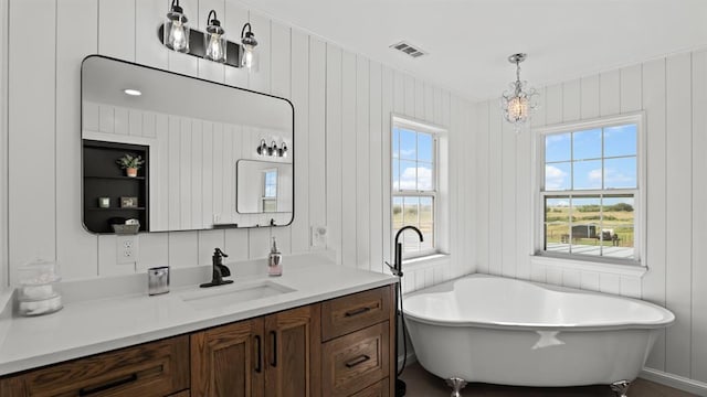 10506 W Smith Rd, El Reno, OK 73036 - bathroom with vanity and a freestanding tub